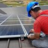 Technician working on solar panels