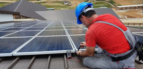 Technician working on solar panels